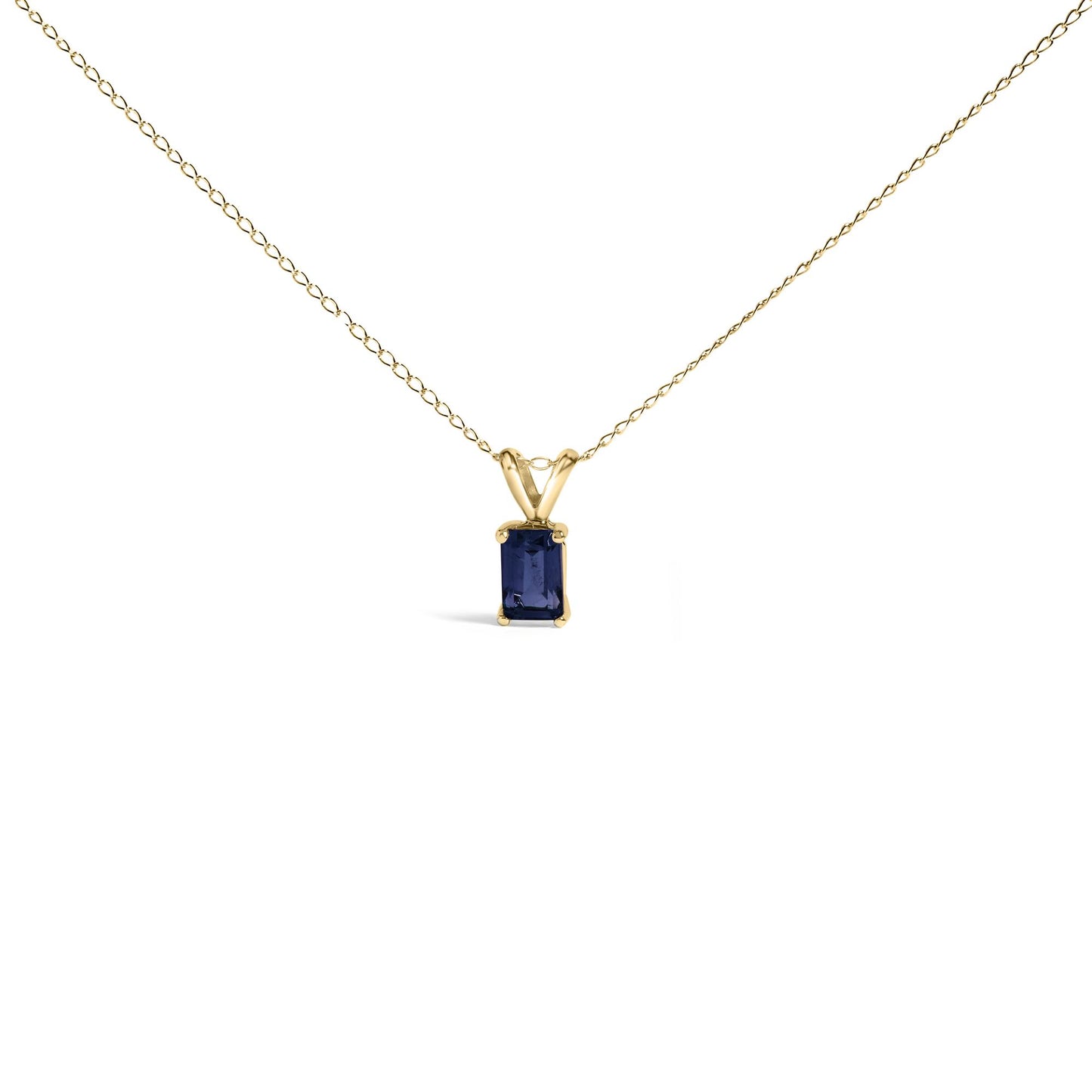Yellow metal necklace with a rectangular blue gemstone pendant in a four-prong setting, shown in a centered front-facing angle on a white background.