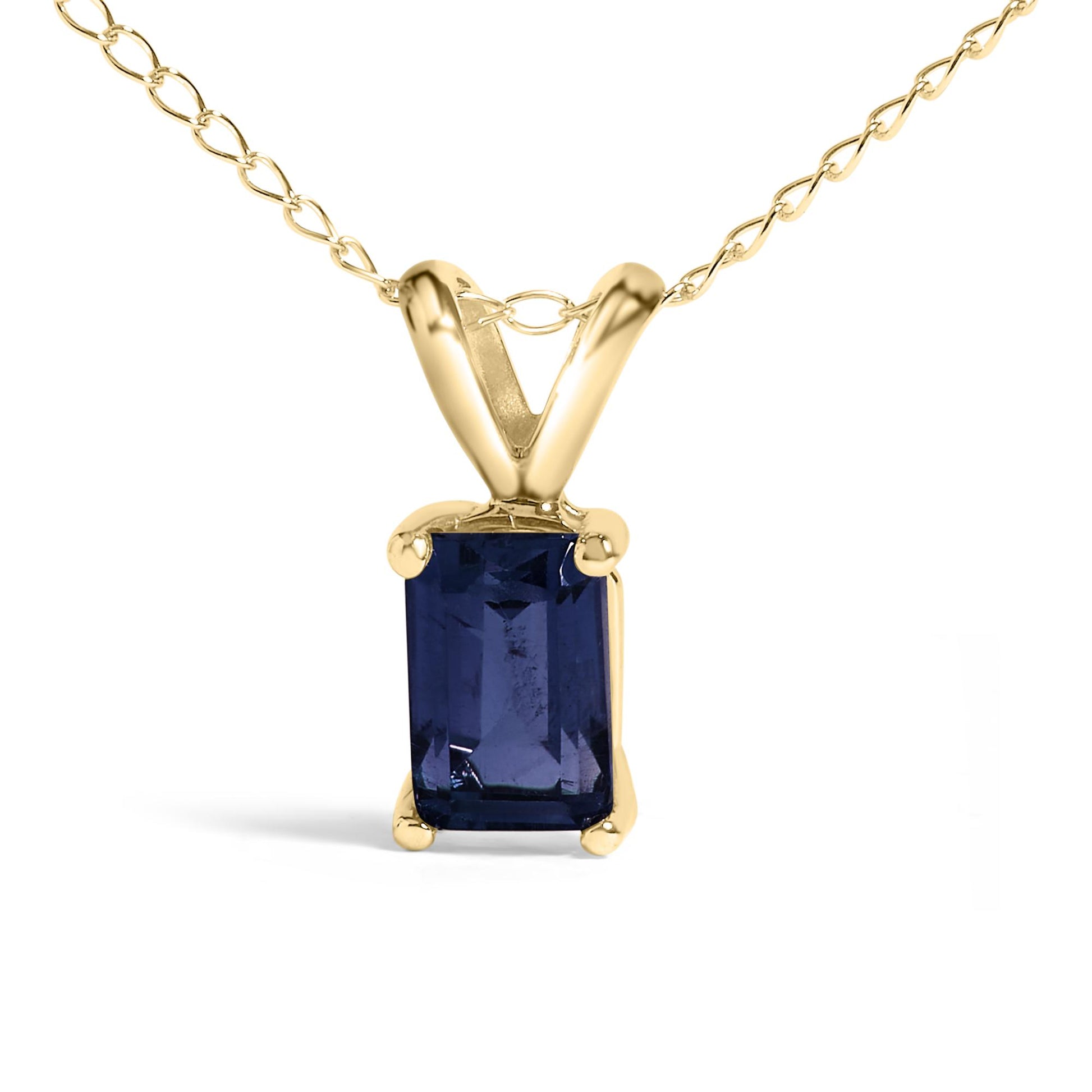Close-up front angle of a yellow necklace with a rectangular blue gemstone in a four-prong setting.