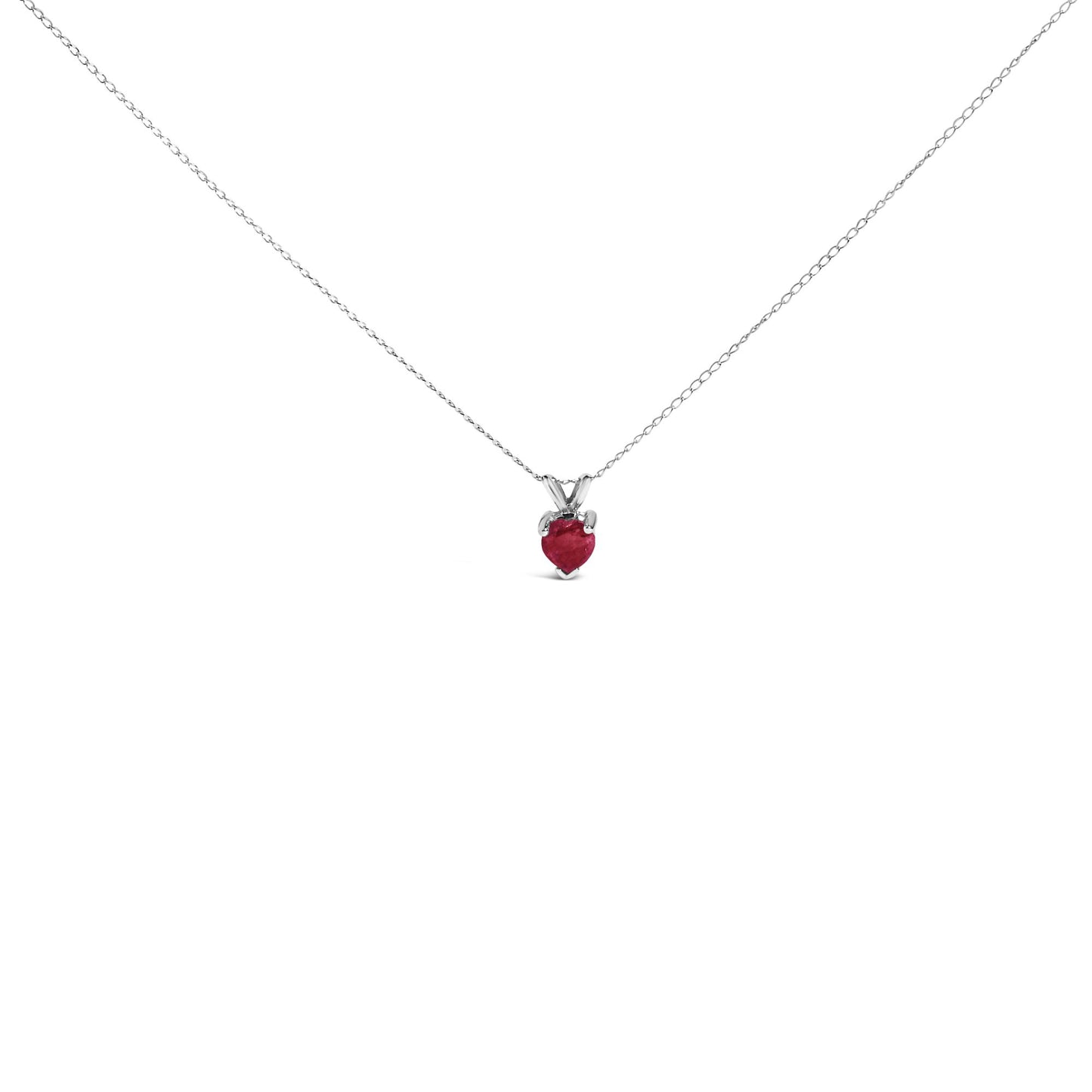 White metal necklace with a heart-shaped red gemstone pendant in a three-prong setting, shown in a front-facing close-up.