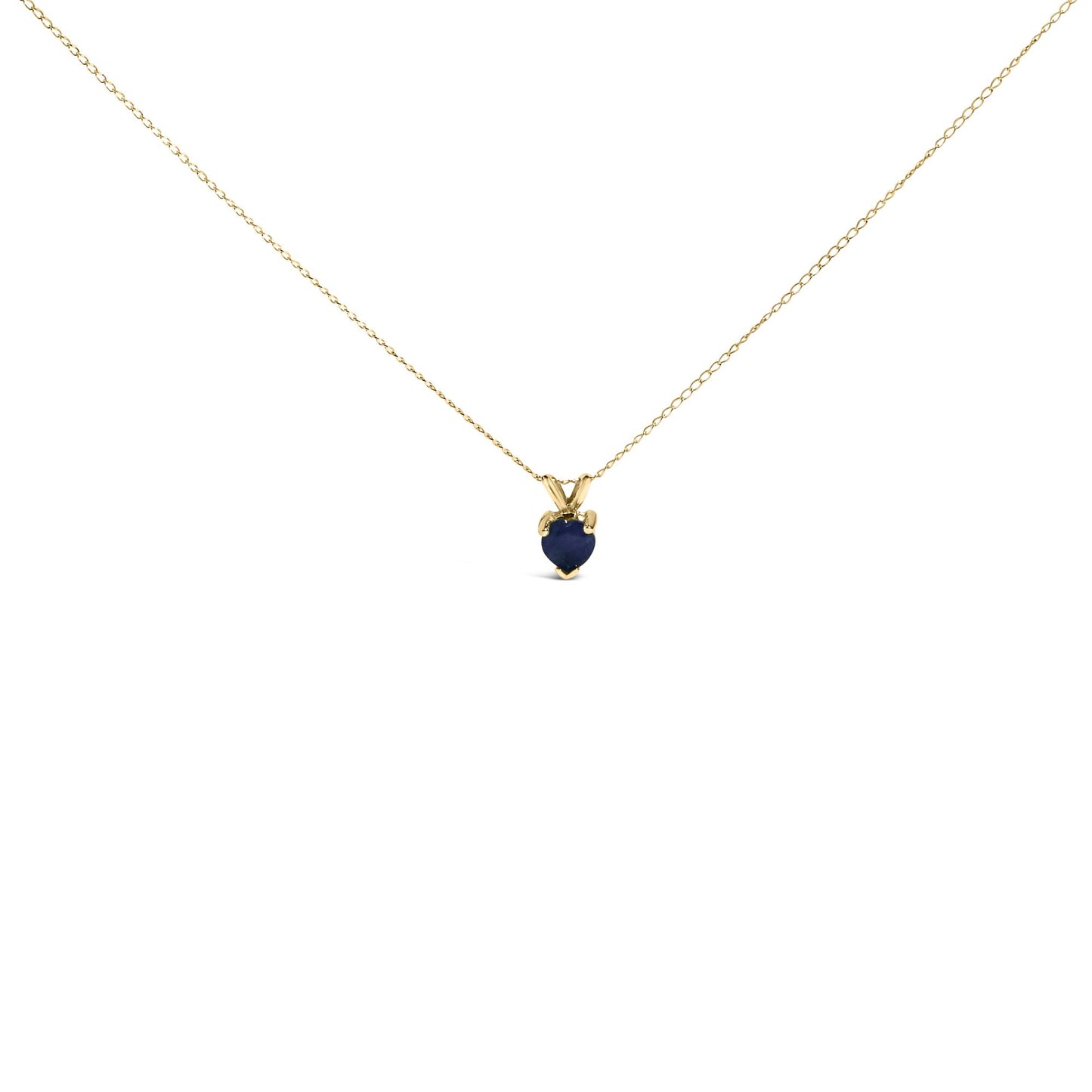 Close-up front view of a yellow metal necklace with a heart-shaped blue gemstone pendant in a three-prong setting shown on a white background.