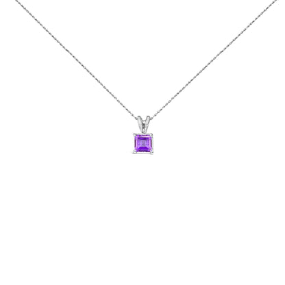 White necklace with a princess-shaped purple gemstone pendant in a four-prong setting, shown in a front-facing close-up shot.