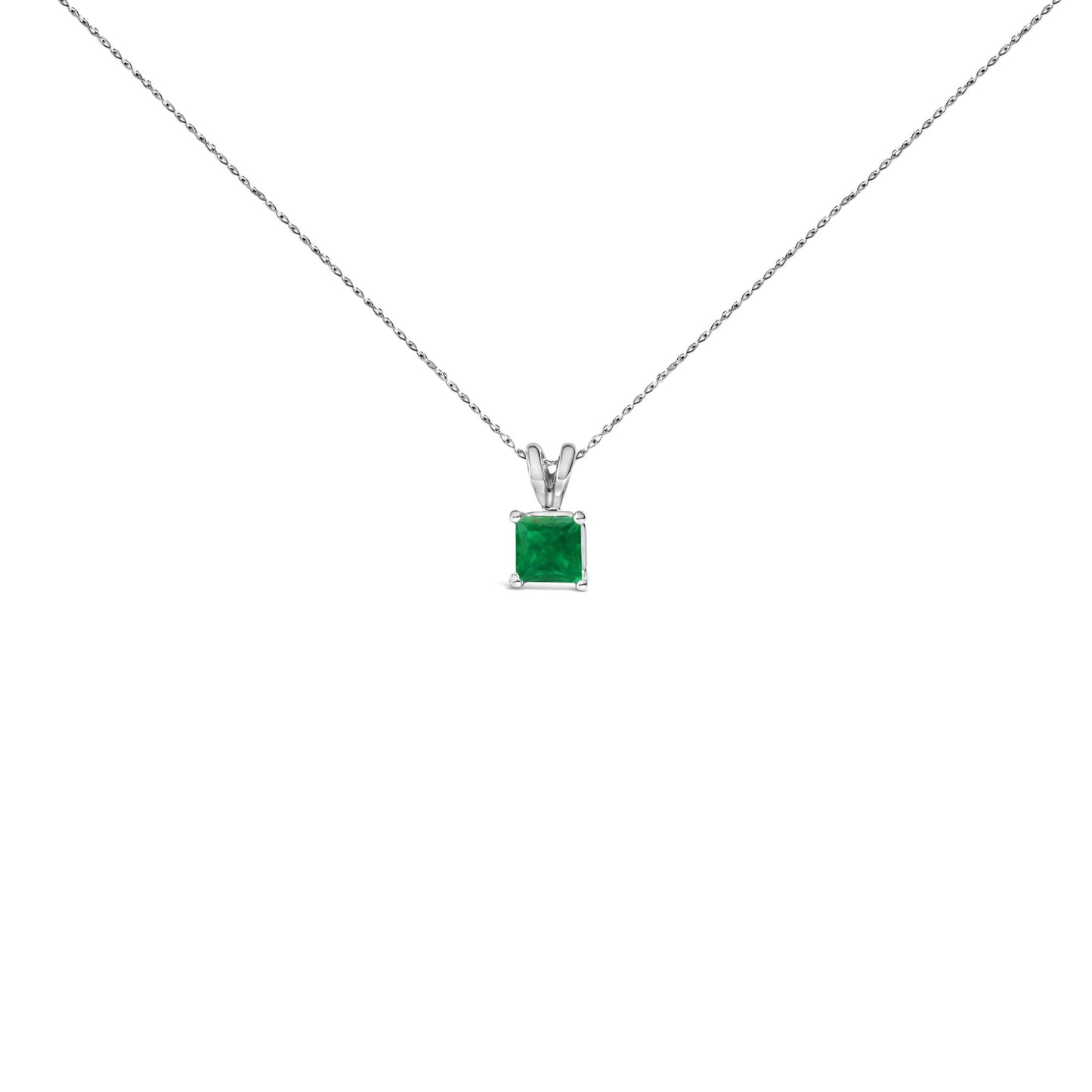 Front-facing shot of a white necklace with a square green gemstone pendant in a four-prong setting.