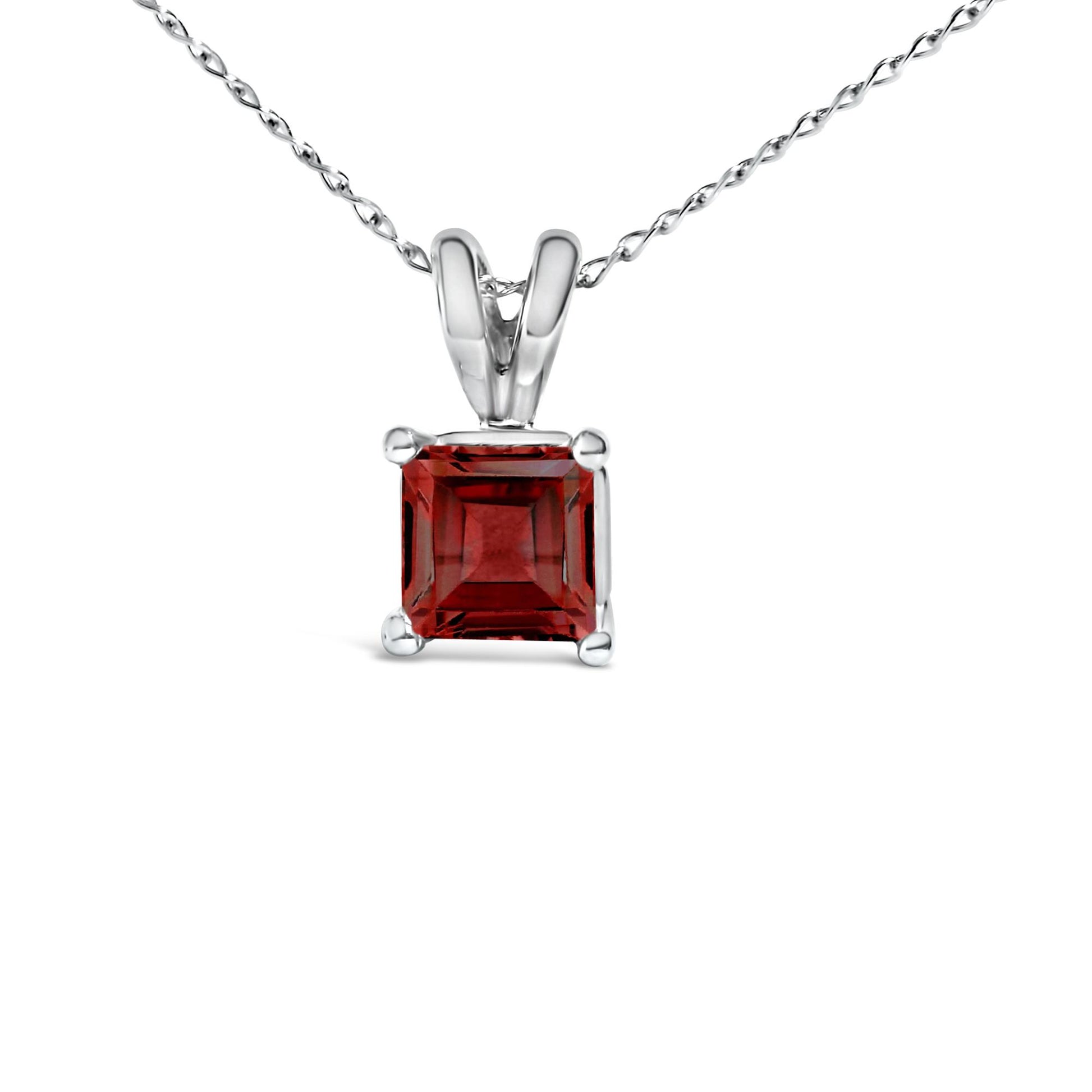 Close-up front angle of a white necklace with a square red gemstone in a four-prong setting.