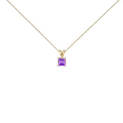 Front angle view of a yellow necklace with a square purple gemstone pendant in a four-prong setting.
