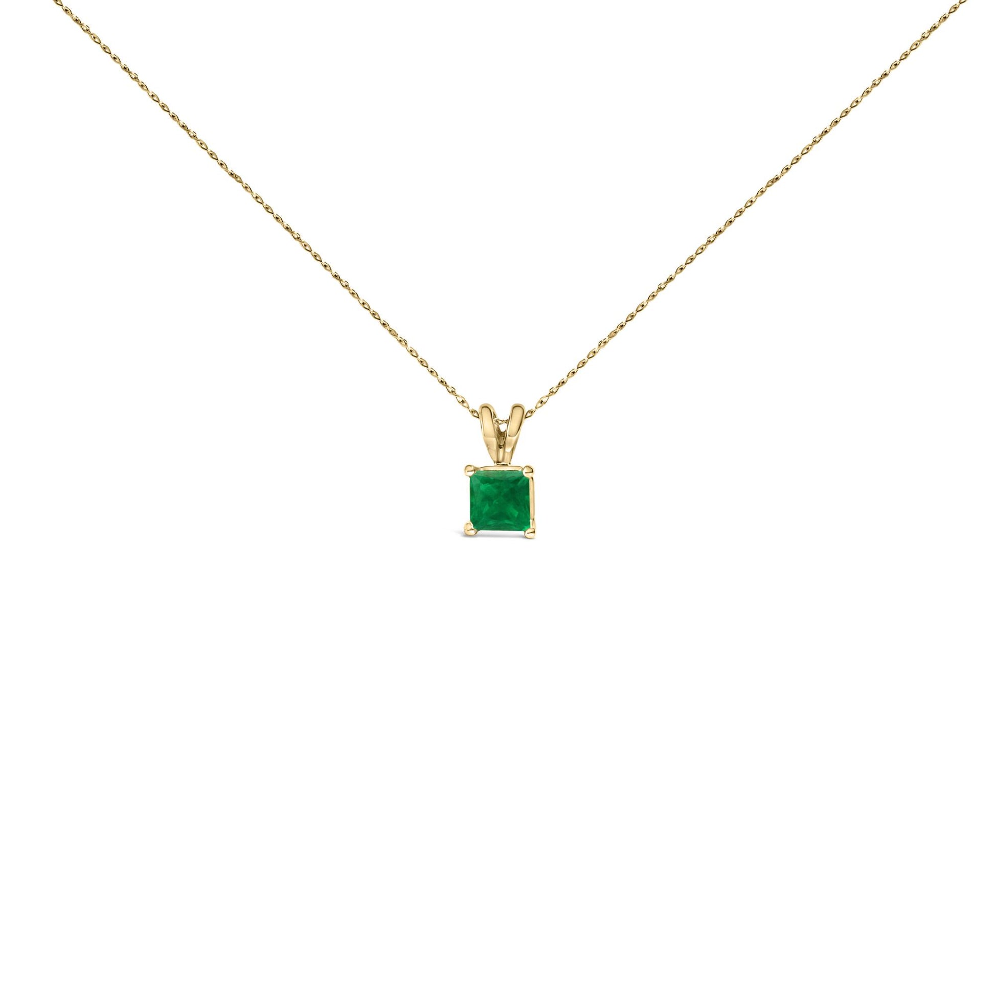 Front view of a yellow necklace with a square green gemstone pendant in a four-prong setting.