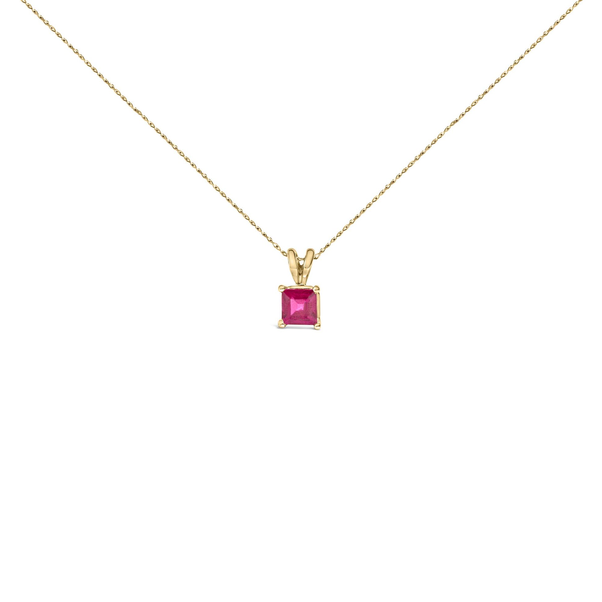 Yellow necklace with a square red gemstone pendant in a four-prong setting, shown in a front-facing close-up shot on a white background.