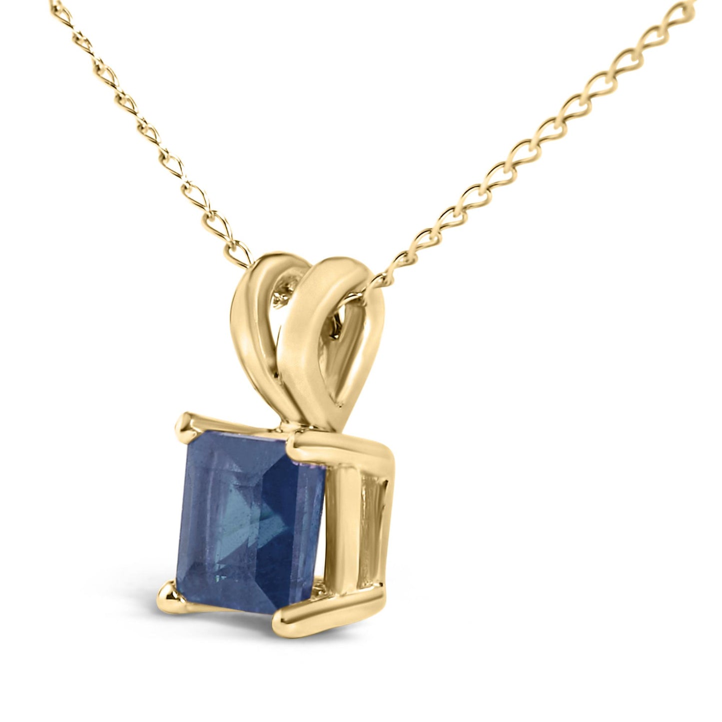 Close-up front angle of a yellow metal necklace with a square-shaped blue gemstone pendant in a four-prong setting.