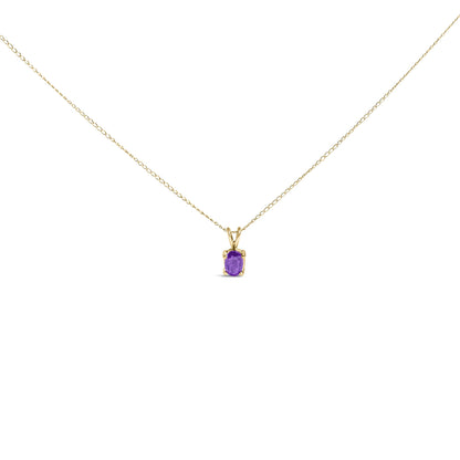 Front-facing close-up of a yellow necklace featuring a single oval purple gemstone in a four-prong setting on a delicate chain.