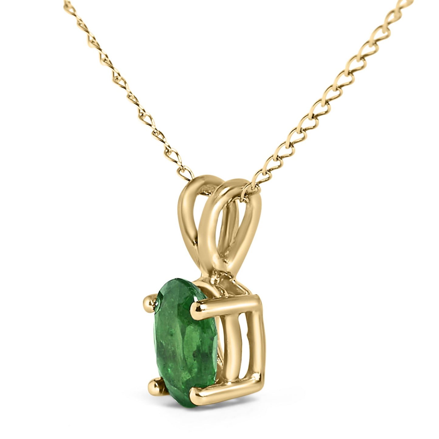 Close-up front angled view of a yellow metal necklace with a pendant featuring an oval green gemstone in a four-prong setting.