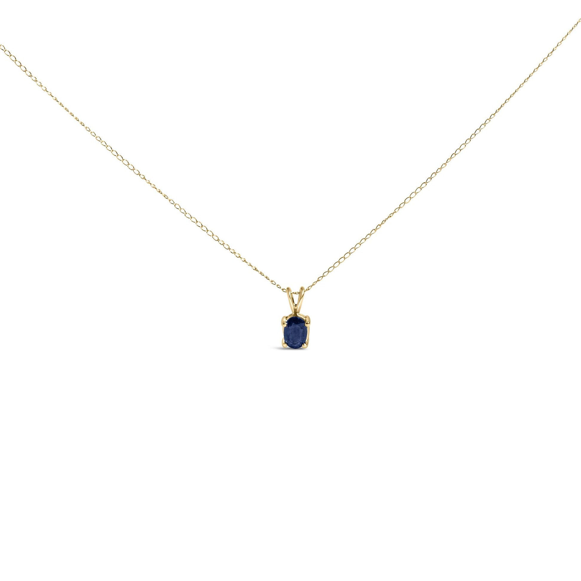 Front view of a yellow necklace with a small oval blue gemstone pendant shown on a white background.