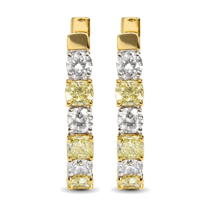 Close-up front view of a pair of earrings shown on a white background featuring alternating cushion-shaped yellow gemstones and round-shaped white gemstones set in prong settings with yellow and white metal accents.