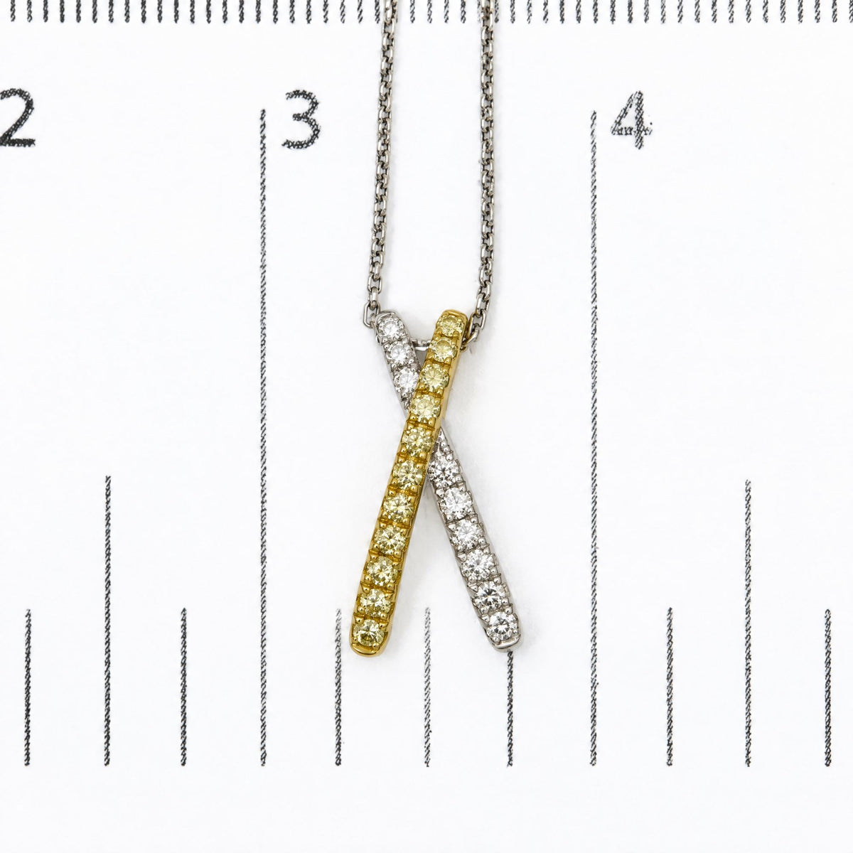 18K White and Yellow Gold 1/2 Cttw Natural Yellow and White Diamond Crossover Pendant Necklace