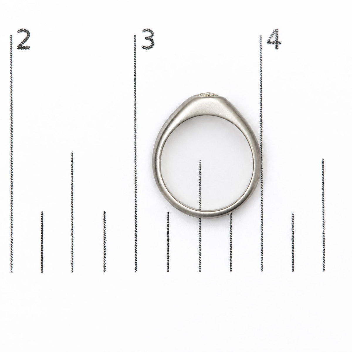 18K White Gold 1/2 Cttw Pear-Shaped Diamond Bezel-Set Solitaire Ring with Tapered Band