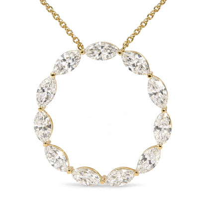 Close-up front view of a yellow metal necklace with a circular pendant made of marquise-shaped white gemstones in a shared prong setting.
