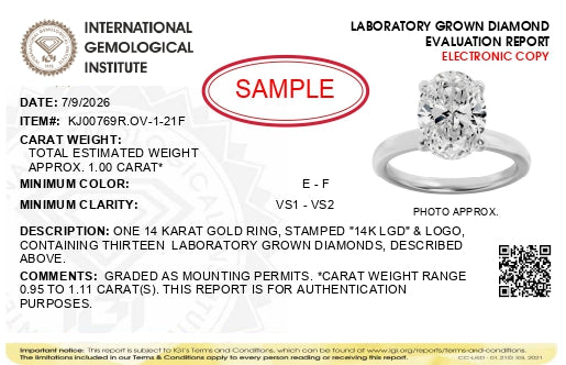 Alt text: White ring shown from a slightly angled top view, featuring an oval-shaped white gemstone held by four prongs in the center, surrounded by multiple smaller round white gemstones in prong settings around the band.