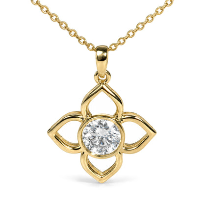 Close-up front view of a yellow metal necklace with a flower-shaped pendant featuring a round white gemstone in a bezel setting at the center.