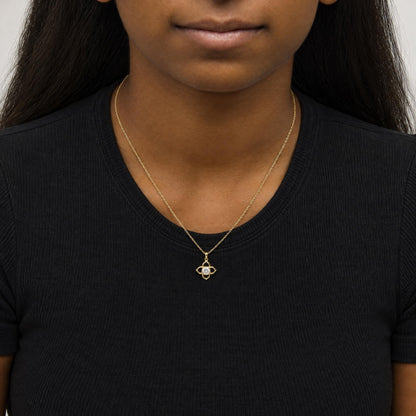 Close-up front view of a model wearing a yellow necklace with a pendant featuring a flower-like design holding one round white gemstone in a bezel setting.