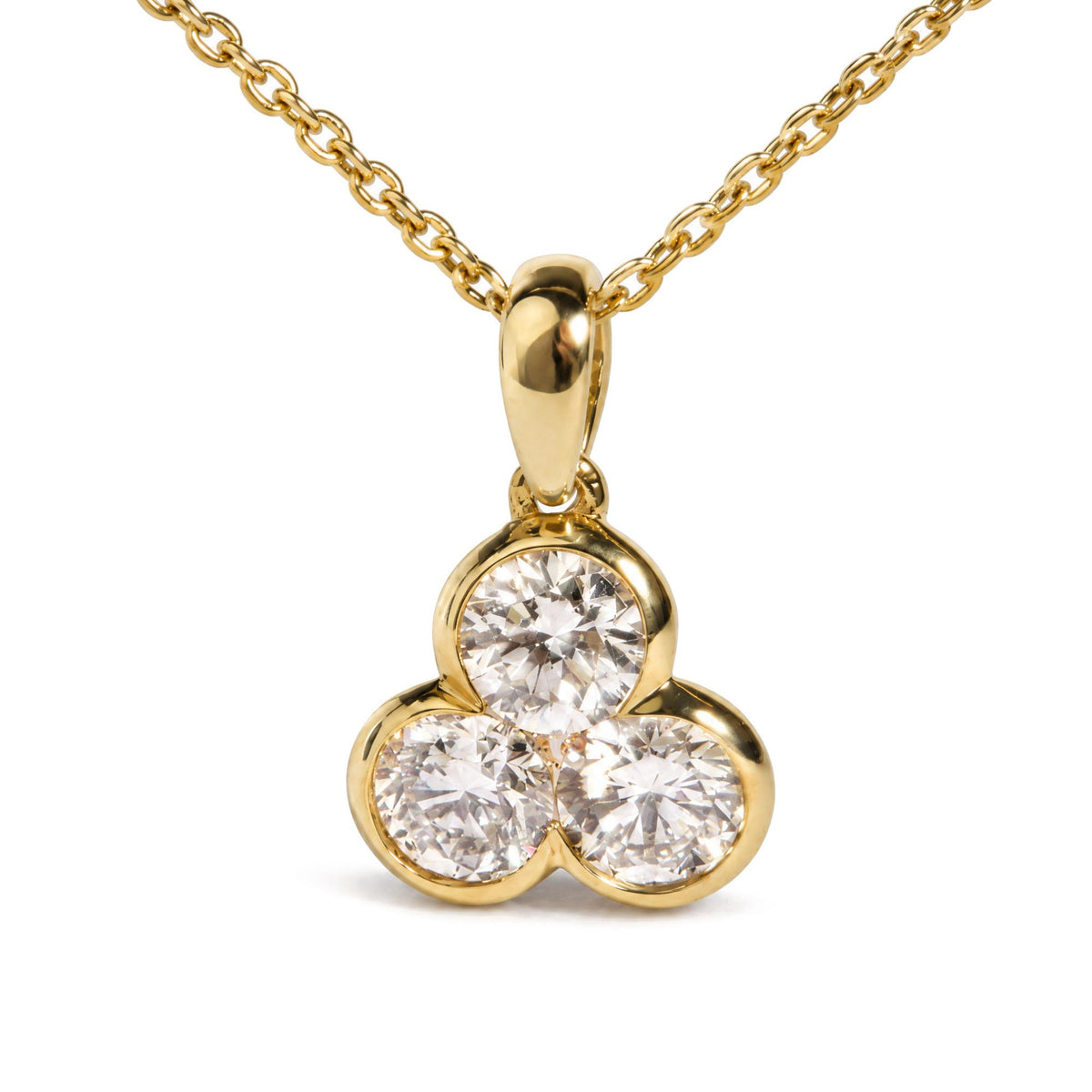 Close-up front view of a yellow necklace chain with a pendant featuring three round white gemstones in bezel settings.
