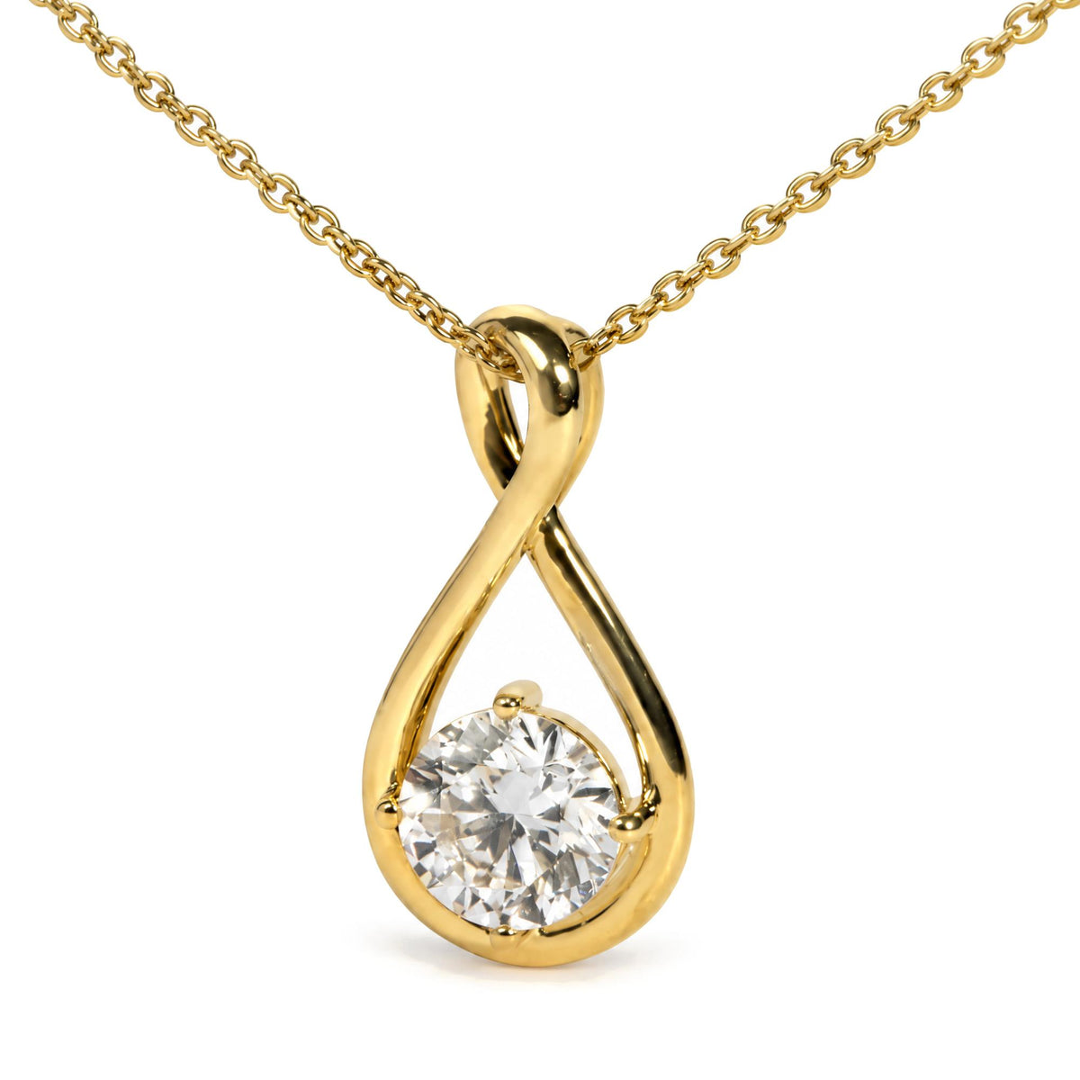 Close-up front view of a yellow necklace with a twisted teardrop-shaped pendant featuring a round white gemstone in a four-prong setting.