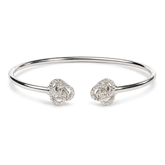 Front view of .925 sterling silver diamond accent love knot flexy open bangle bracelet on white background