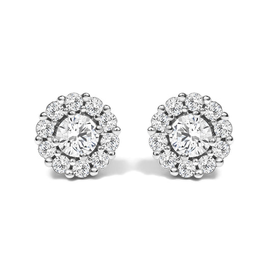 Pair of round white metal stud earrings with a central round white gemstone in four-prong setting, surrounded by smaller round white gemstones in shared prong setting, shown from the front angle on a white background.