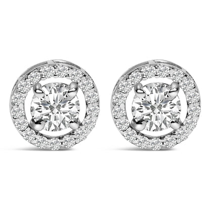 Front view of a pair of circular white cuff links, each featuring a large round white gemstone in a four-prong setting surrounded by a circle of smaller round white gemstones.