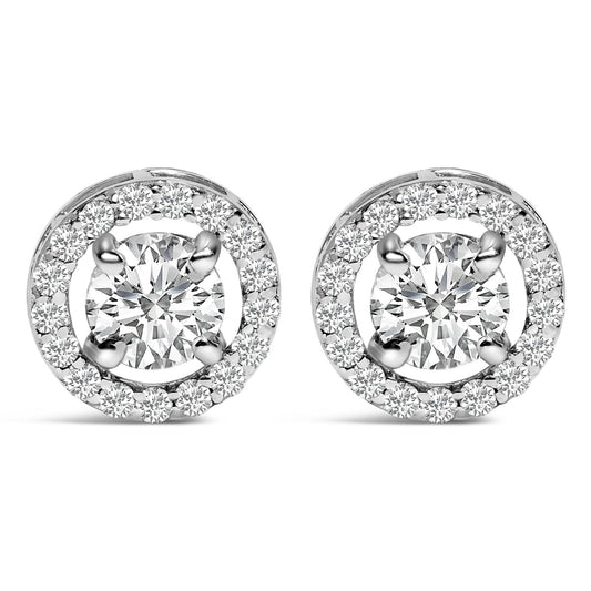 Front view of a pair of circular white cuff links, each featuring a large round white gemstone in a four-prong setting surrounded by a circle of smaller round white gemstones.