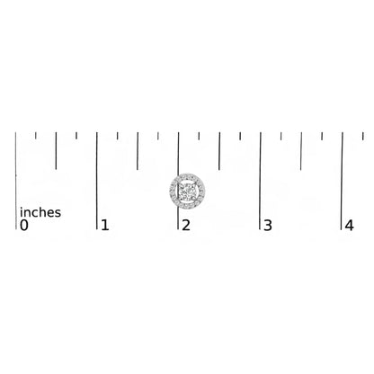 White metal cuff link with a round center red gemstone surrounded by a circle of small white gemstones, shown on a scale from a top-down angle.