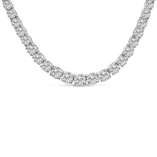 Close-up front angle of a white metal necklace featuring round white gemstones in 4-prong settings.
