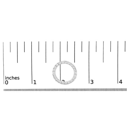White metal ring with asscher-shaped white gemstones in a shared prong setting, shown flat on a measuring scale, top-down view.