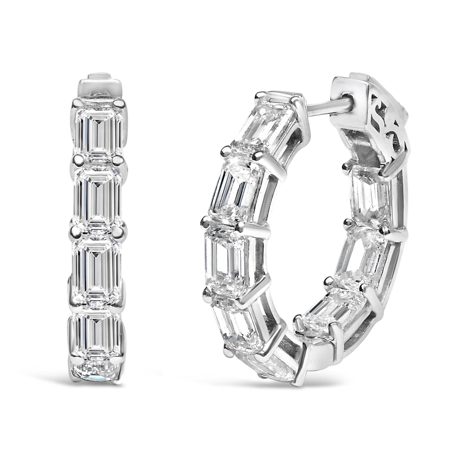 Close-up front and side angled view of a pair of white hoop earrings set with multiple emerald-shaped white gemstones in a shared prong setting.
