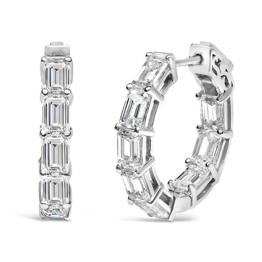Close-up front and side angled view of a pair of white hoop earrings set with multiple emerald-shaped white gemstones in a shared prong setting.