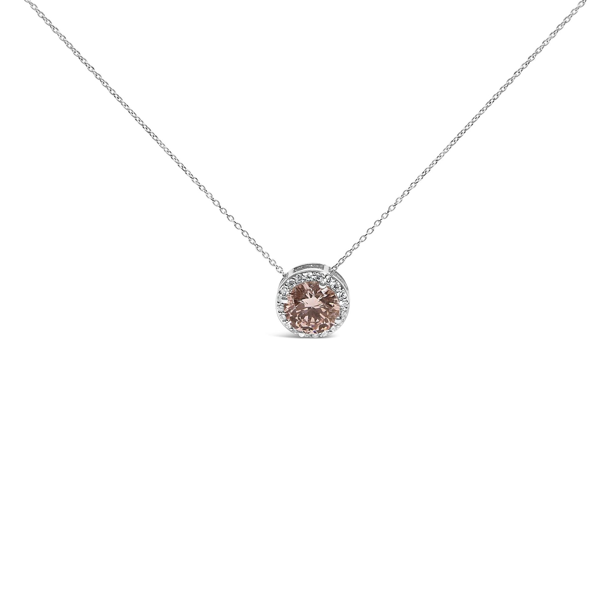 Front view of white metal necklace with a round pink gemstone surrounded by a circle of small white gemstones in 4-prong settings.