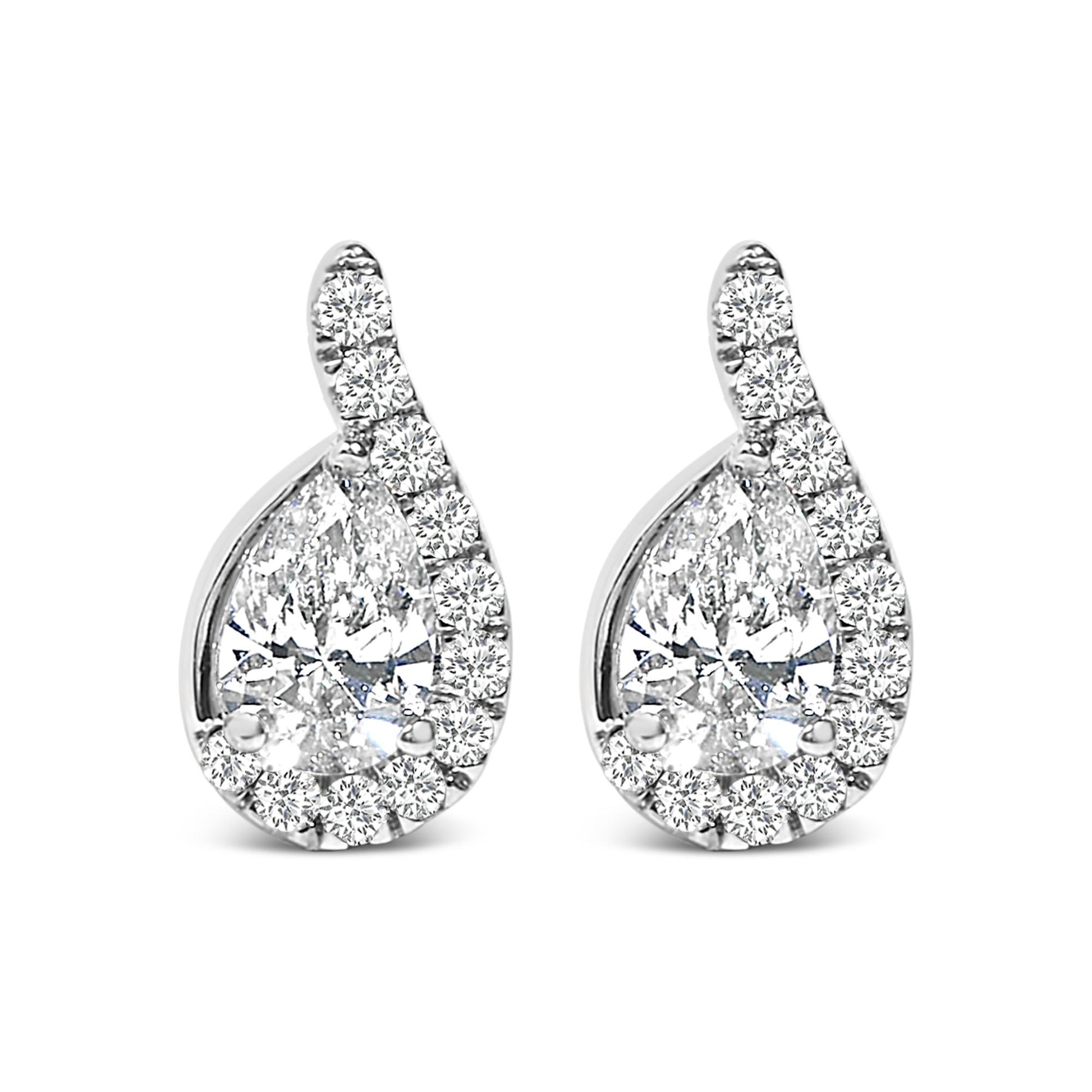 Pair of white metal earrings shown from the front, each featuring a pear-shaped white gemstone surrounded by round white gemstones in a curved design.