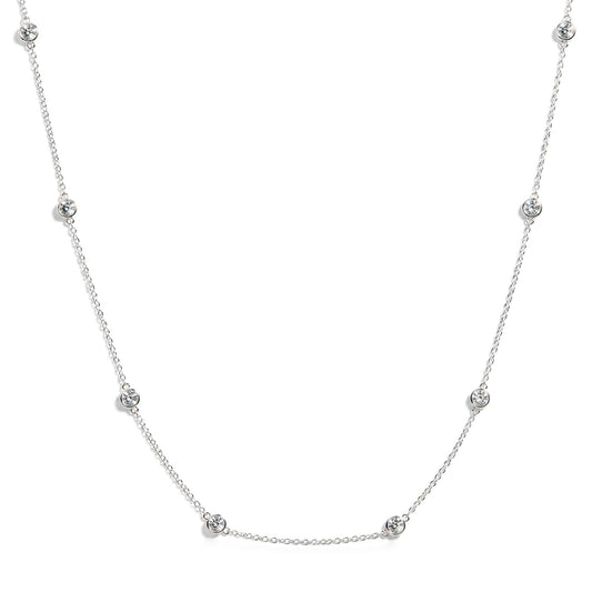 White necklace with round white gemstones in bezel settings along chain, shown on white background with front view.