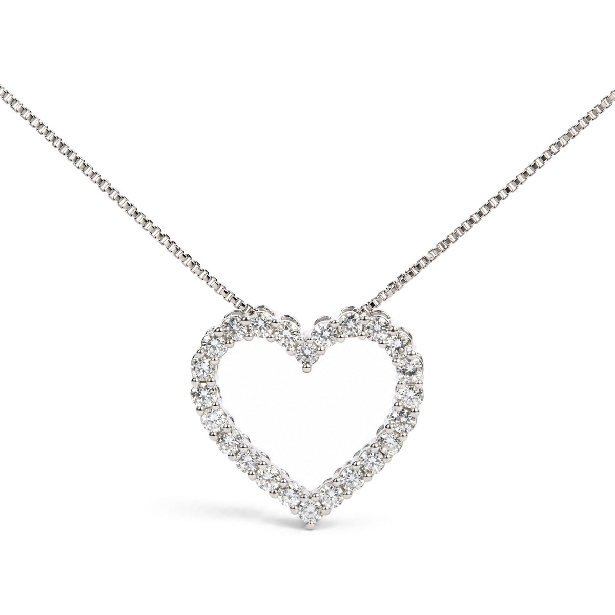 Close-up front view of a white metal necklace featuring a heart-shaped pendant outlined with round white gemstones in prong settings.