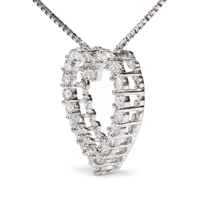 Close-up angled view of a white metal necklace with round white gemstones set in prong settings forming a heart shape, shown on a white background.