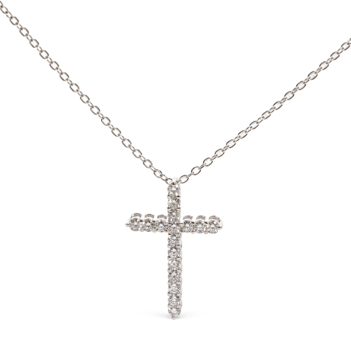 Front view of a white necklace chain with a cross pendant adorned with round white gemstones in prong settings.