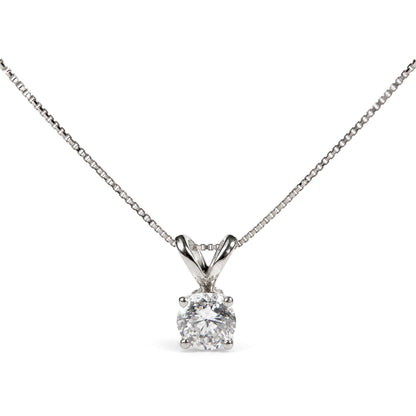 Close-up front view of a white necklace with a chain and a pendant featuring a round white gemstone in a prong setting.