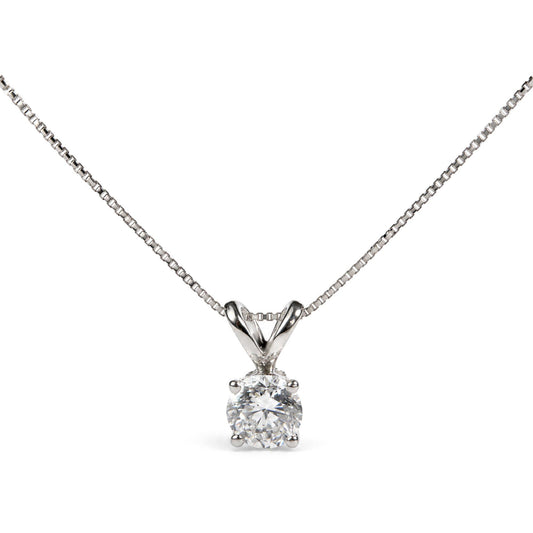 Close-up front view of a white necklace with a chain and a pendant featuring a round white gemstone in a prong setting.