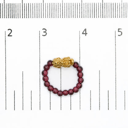 18K Yellow Gold Red Garnet Beaded Stretch Ring with Sculpted Dragon Charm