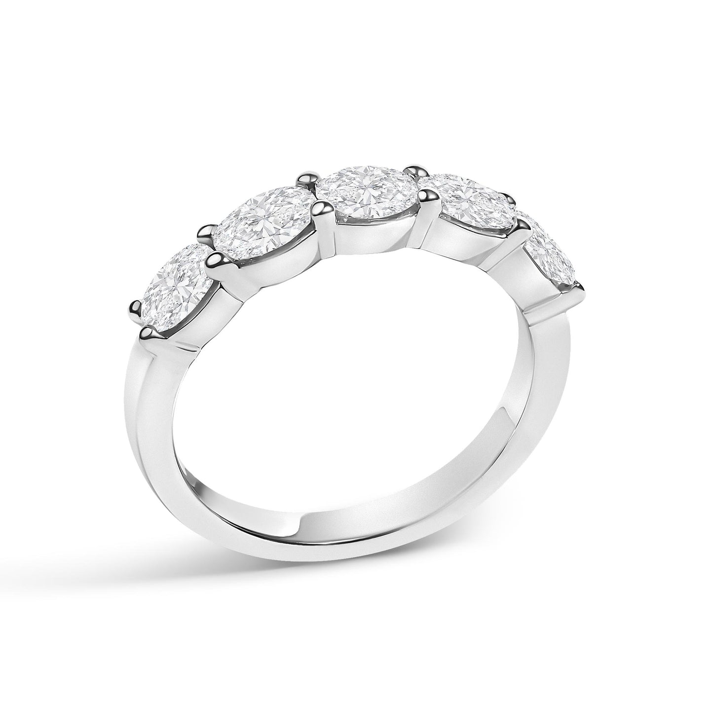 White metal ring with five oval-shaped white gemstones set in a shared prong setting, shown at a slight angle against a white background.