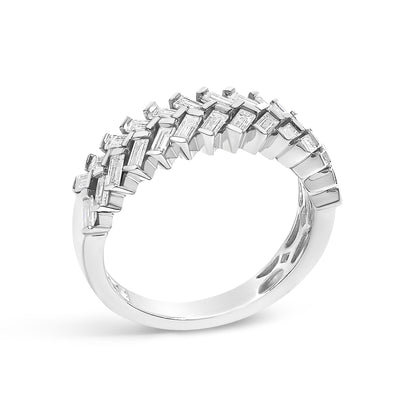 White metal ring with two rows of channel-set, baguette-shaped white gemstones, shown from a side angle.