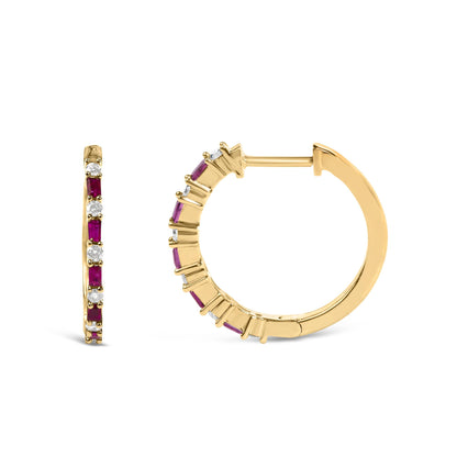 Close-up front and side views of yellow metal hoop earrings with alternating red baguette-shaped gemstones and round white gemstones in prong settings.
