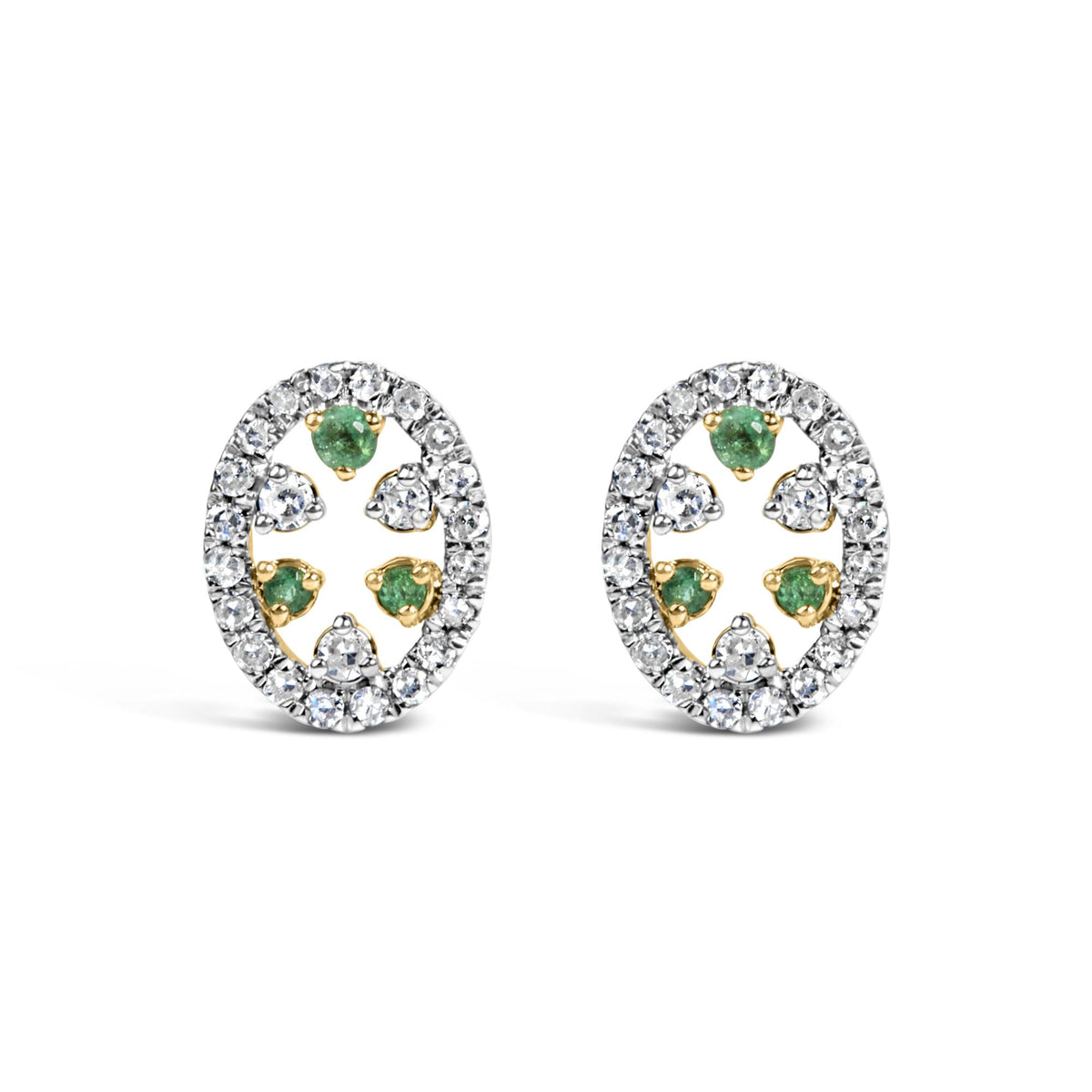 Close-up front view of a pair of yellow metal oval earrings featuring white round prong-set gemstones forming the outer edge and surrounding multiple green round prong-set gemstones inside.