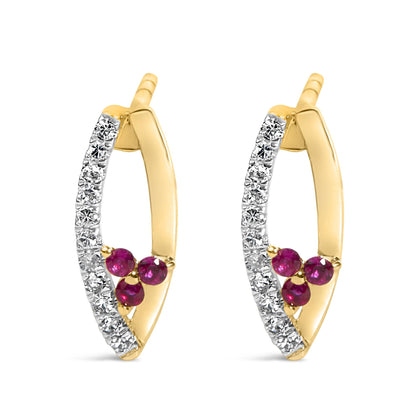 Close-up front angle of yellow metal earrings with a split hoop design, featuring a row of small white round gemstones on one side and a cluster of red round gemstones at the bottom.