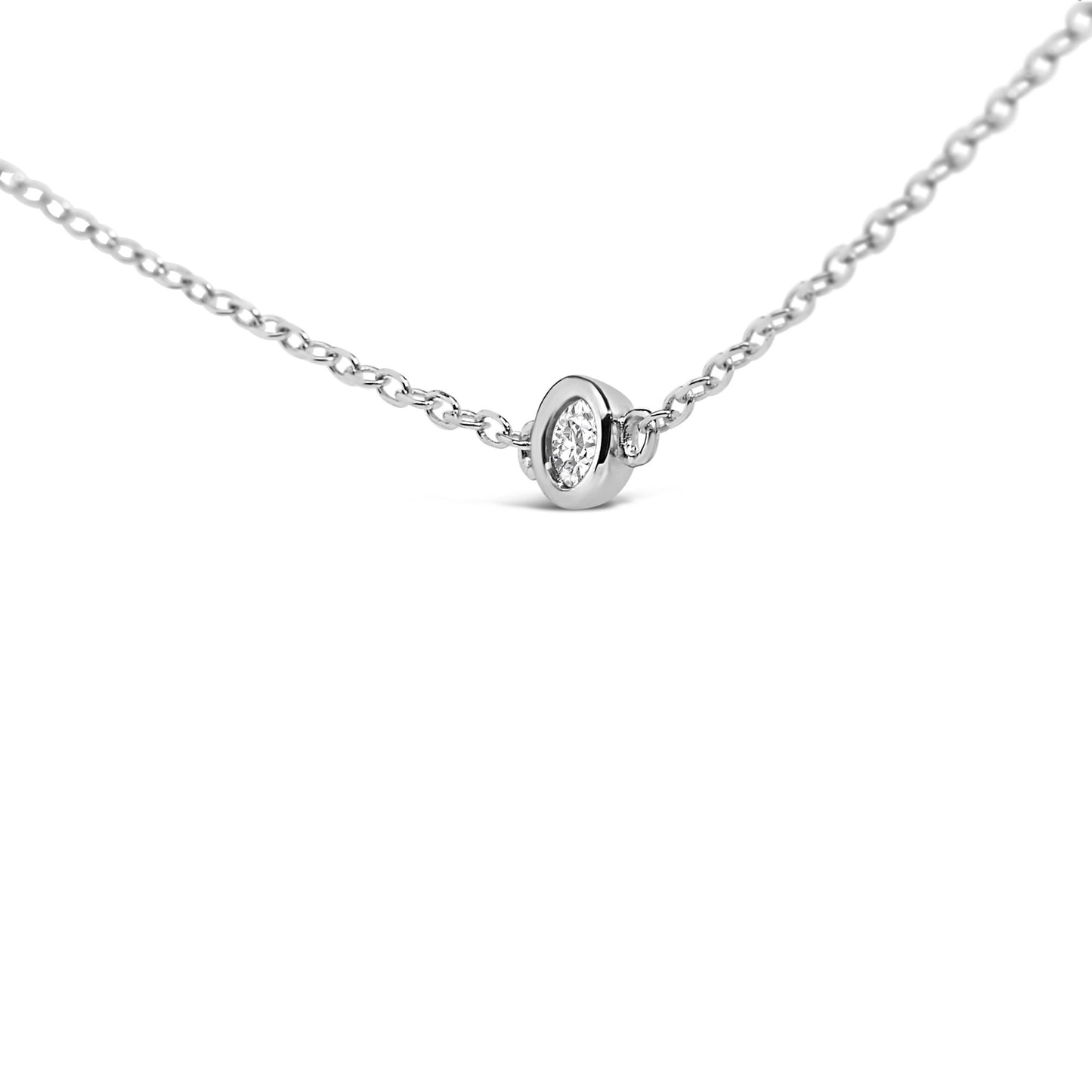 Close-up front angle of a white necklace chain featuring a round bezel-set white gemstone pendant.