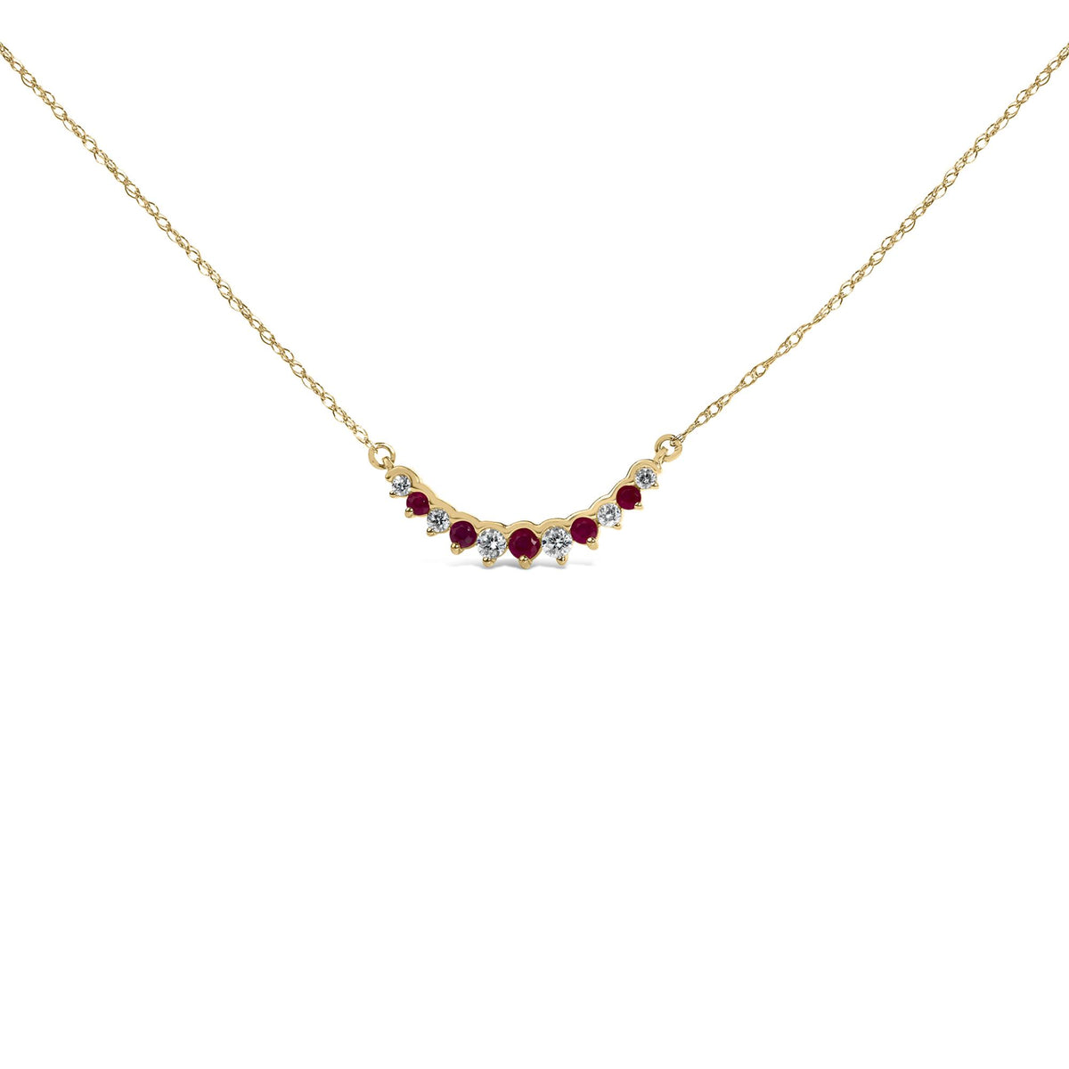 Close-up front angle of a yellow metal necklace with alternating round white and red gemstones in prong settings, shown on a white background.