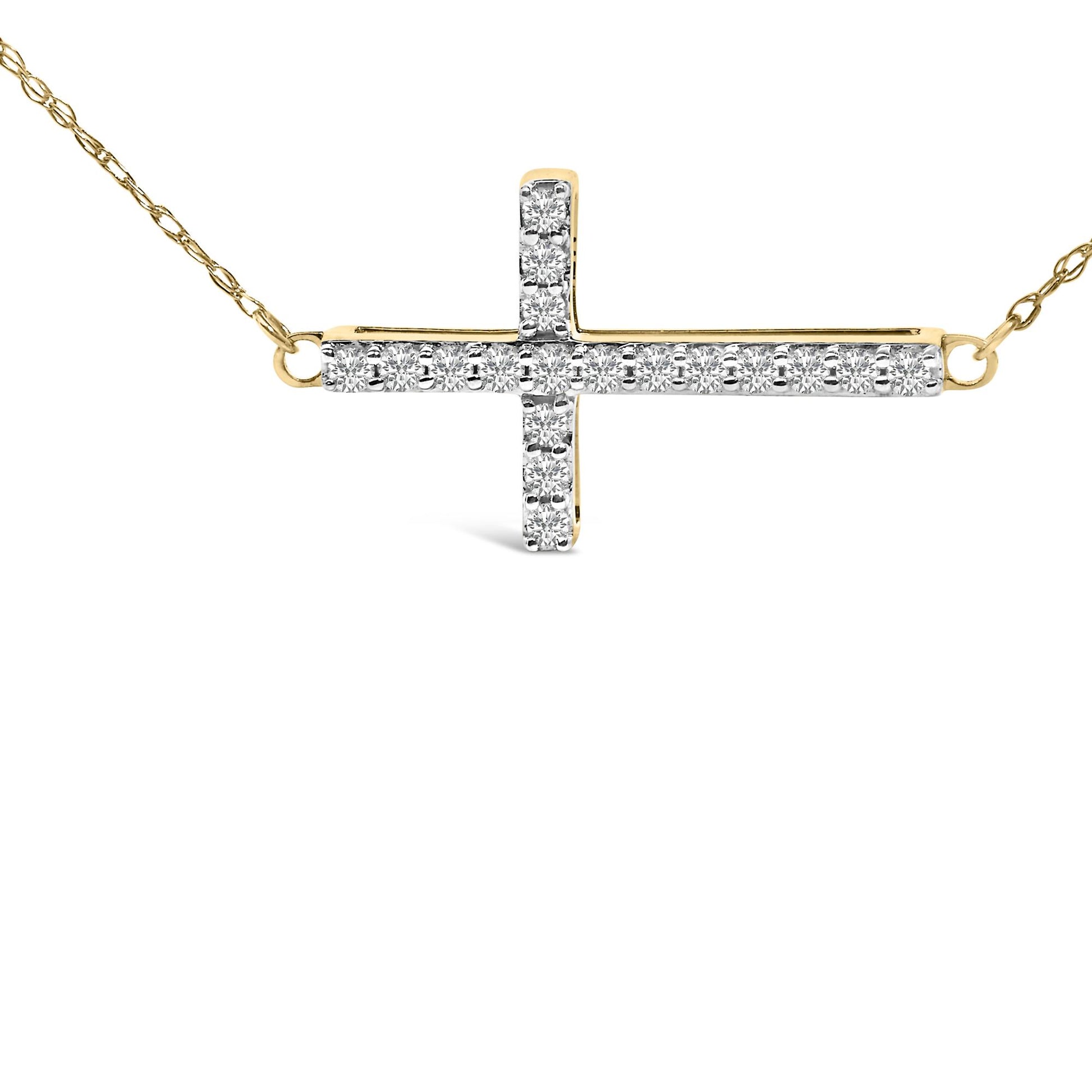 Front-facing close-up of a yellow metal cross necklace adorned with round white gemstones in a shared prong setting.
