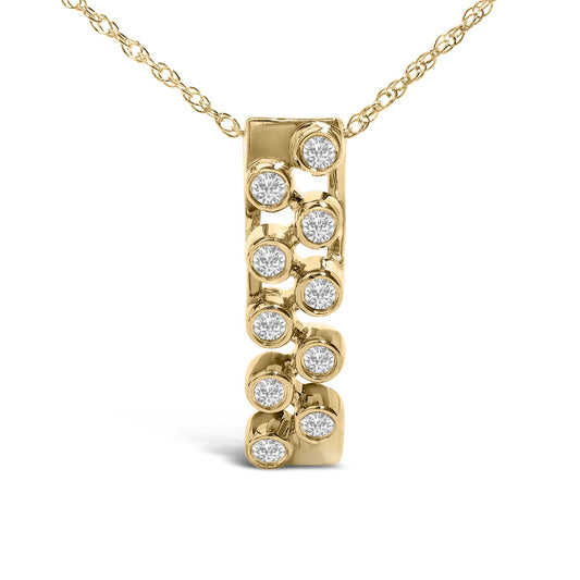 Front view of a yellow metal necklace pendant featuring a vertical bar design with round white gemstones set in bezel settings, shown close-up on a white background.